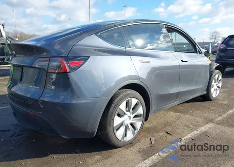 2023 Tesla Model Y Awd/Long Range Dual Motor All-Wheel Drive z USA, uszkodzony, nr VIN 7SAYGDEE2PA103779